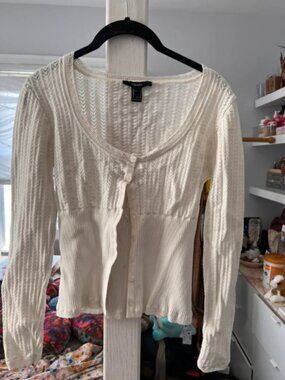 Women’s white long sleeve button up babydoll cardigan